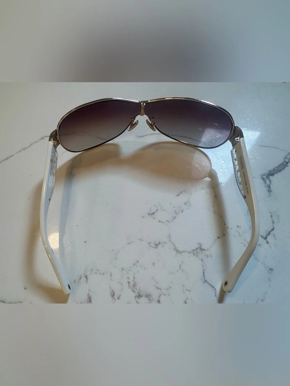 Women’s Coach Leanne S566 wrap golden sunglasses. White with signature C